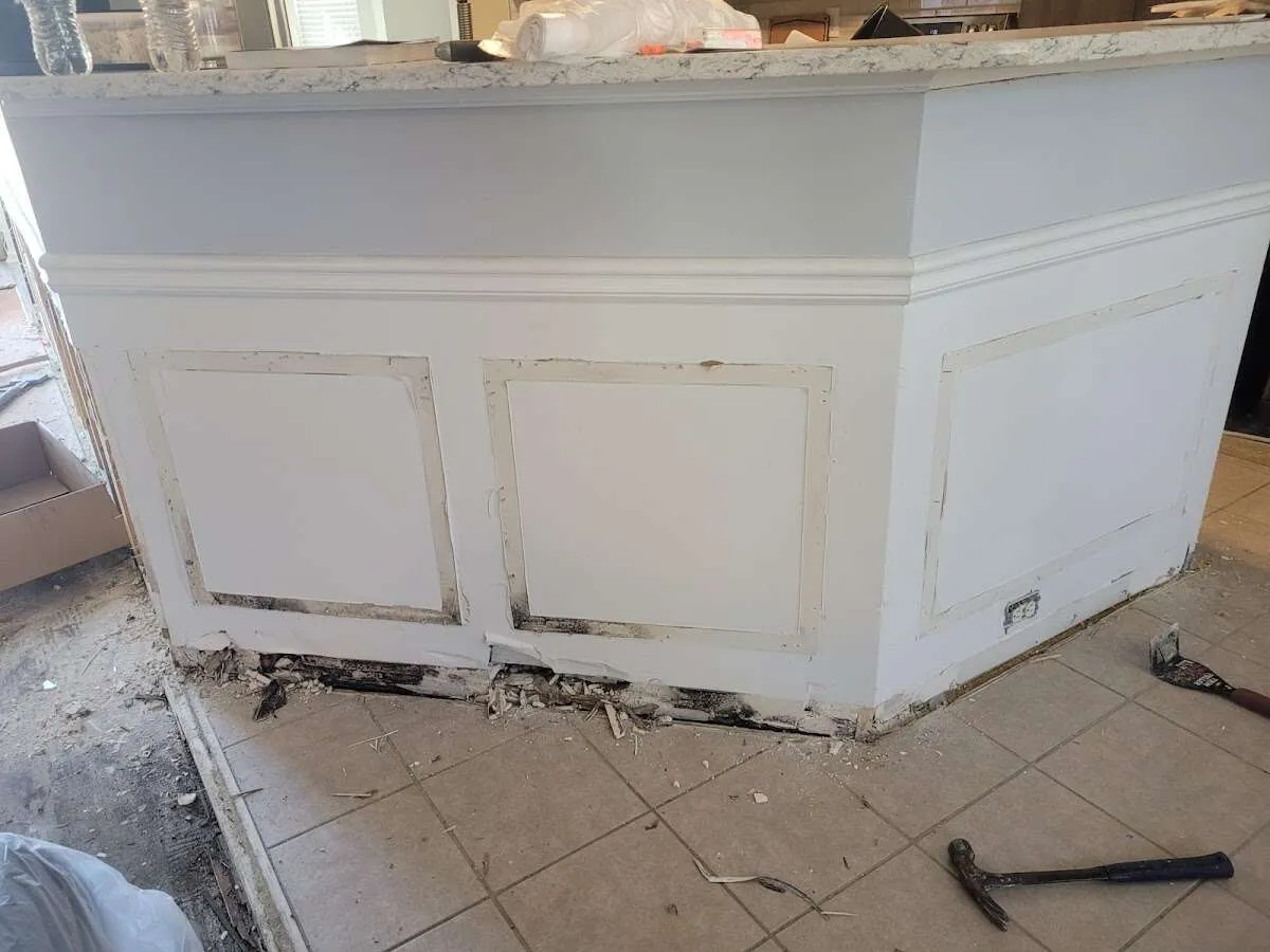 Water damage and mold on kitchen during Storm Damage Restoration in Evans
